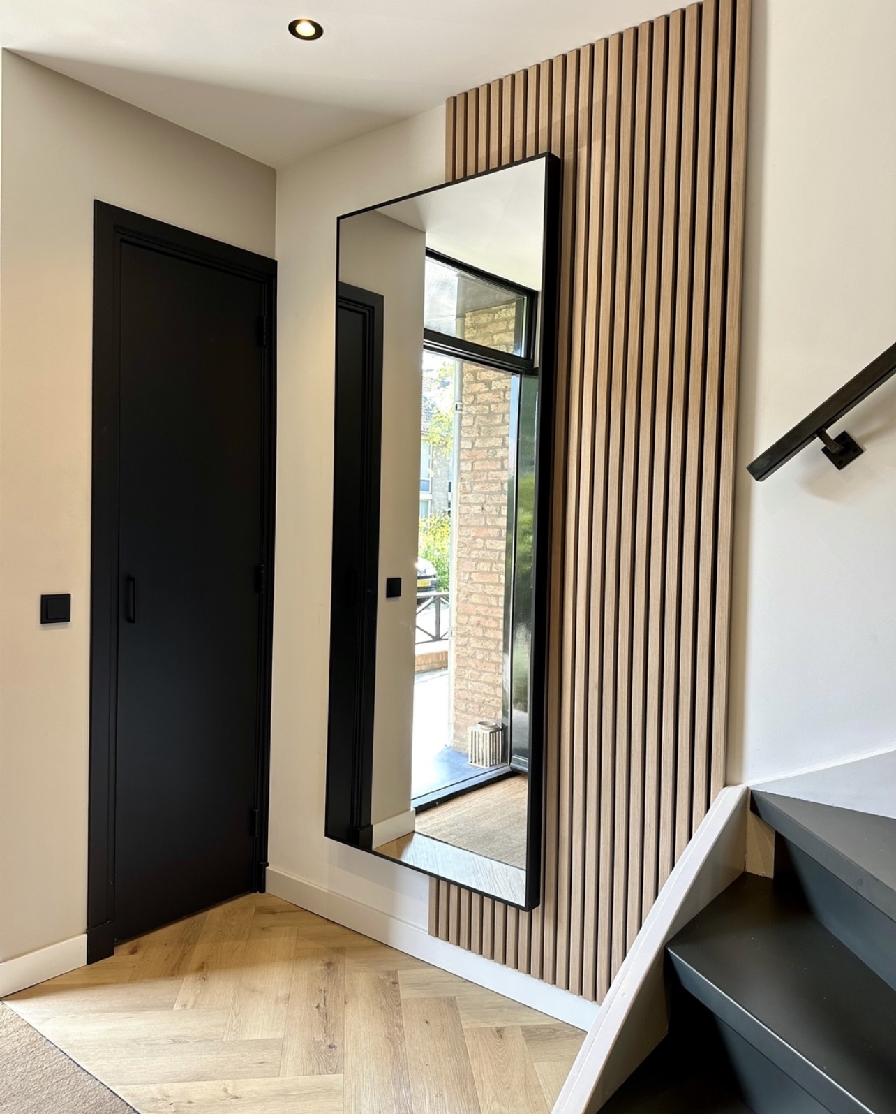 Hallway feature wall and mirror installation